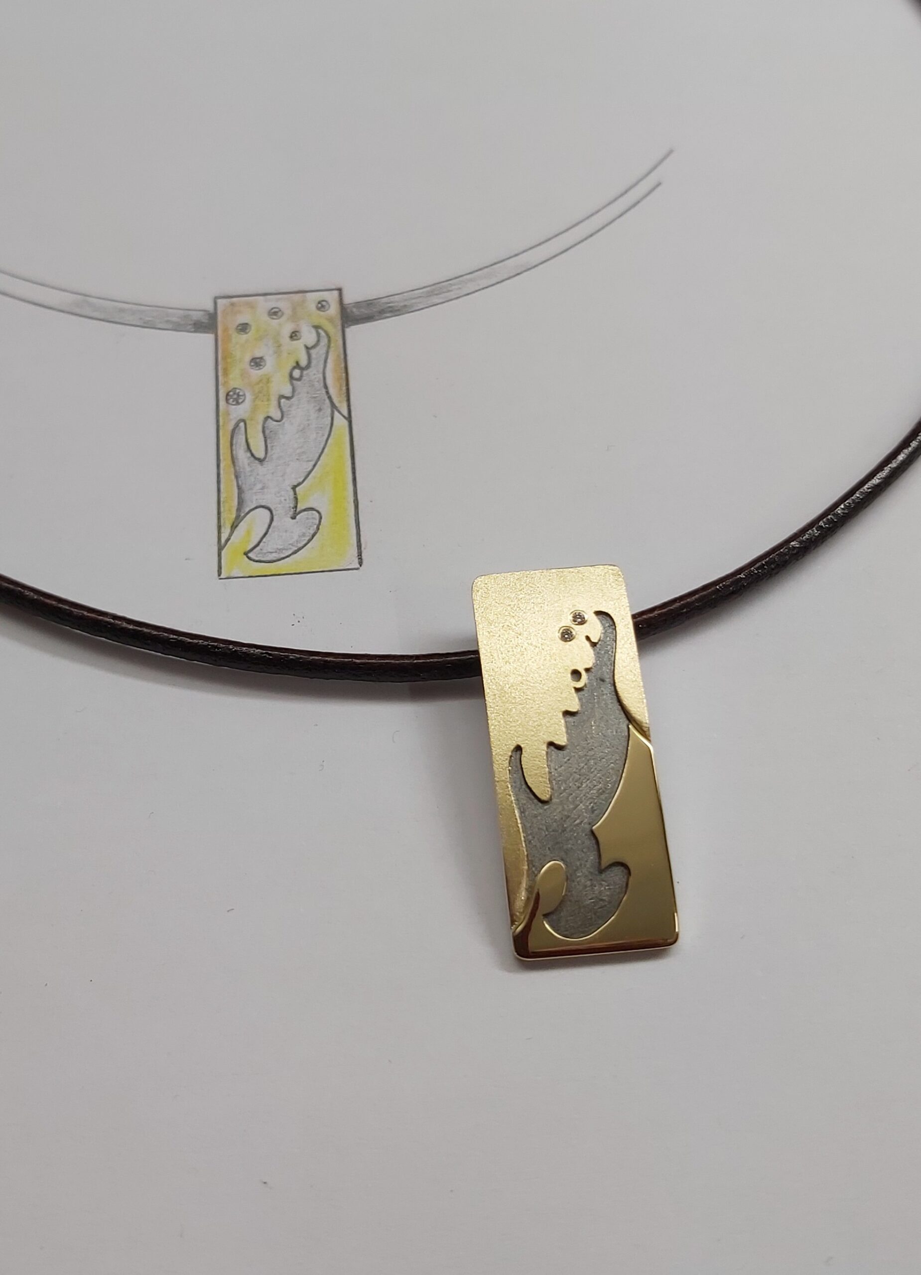 Penjoll d’or i plata amb dos diamants talla brillant (Peça personalitzada)