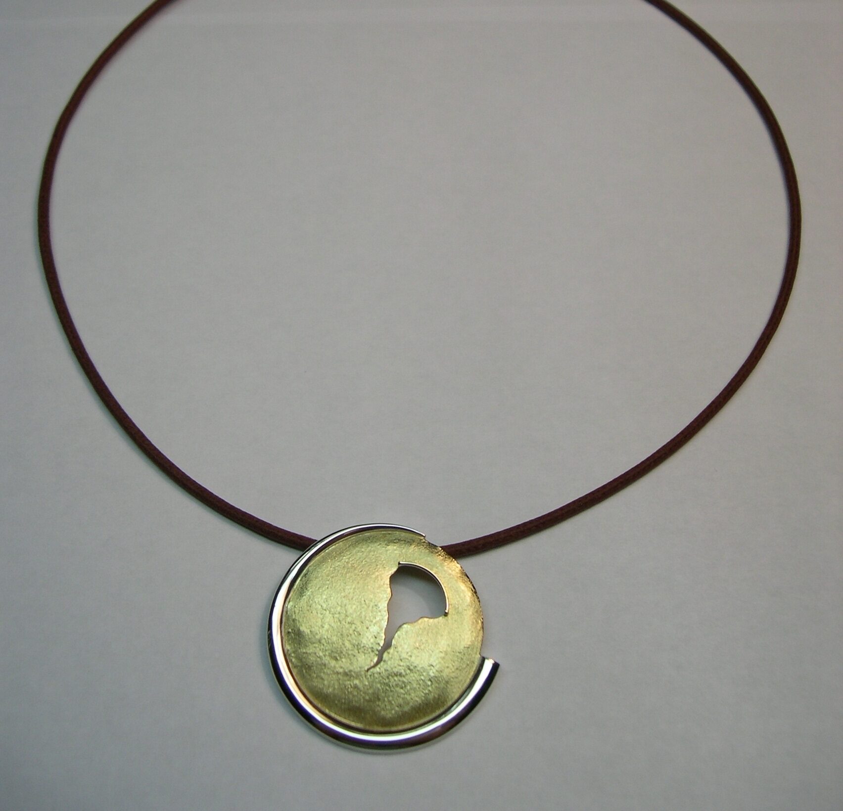 Penjoll d’or groc i plata
